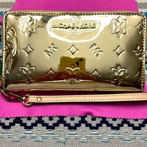 NWT Michael Kors gold wallet.